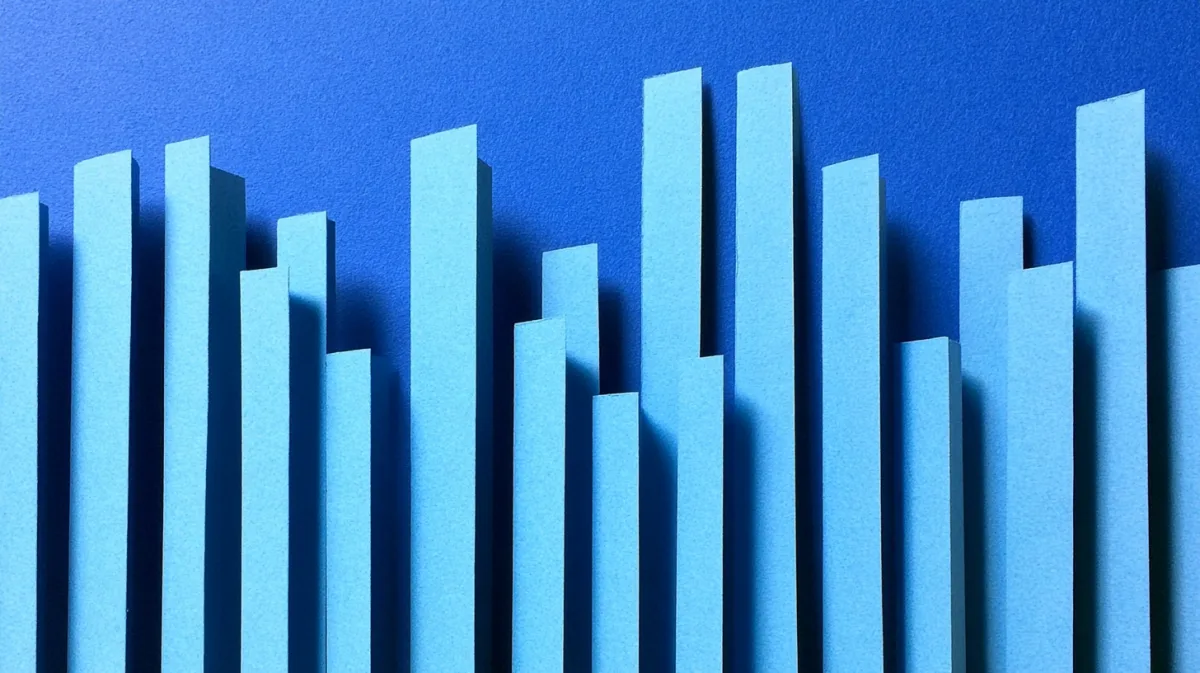 Cut-paper strips of varying heights, like a chart of completion records
